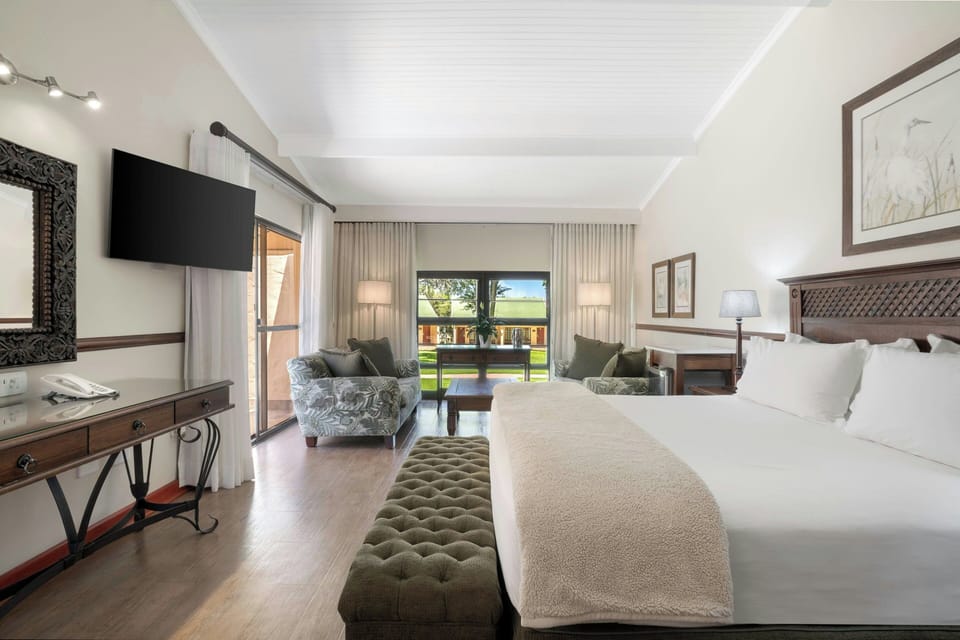 Premium bedding, down comforters, in-room safe, desk