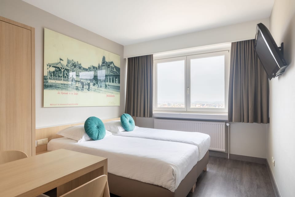 Double Room, City View | Blackout drapes, free WiFi, bed sheets