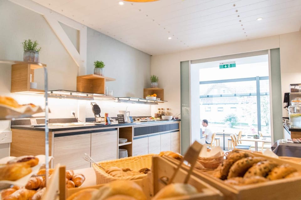 Breakfast, lunch, dinner served; local cuisine, alfresco dining 