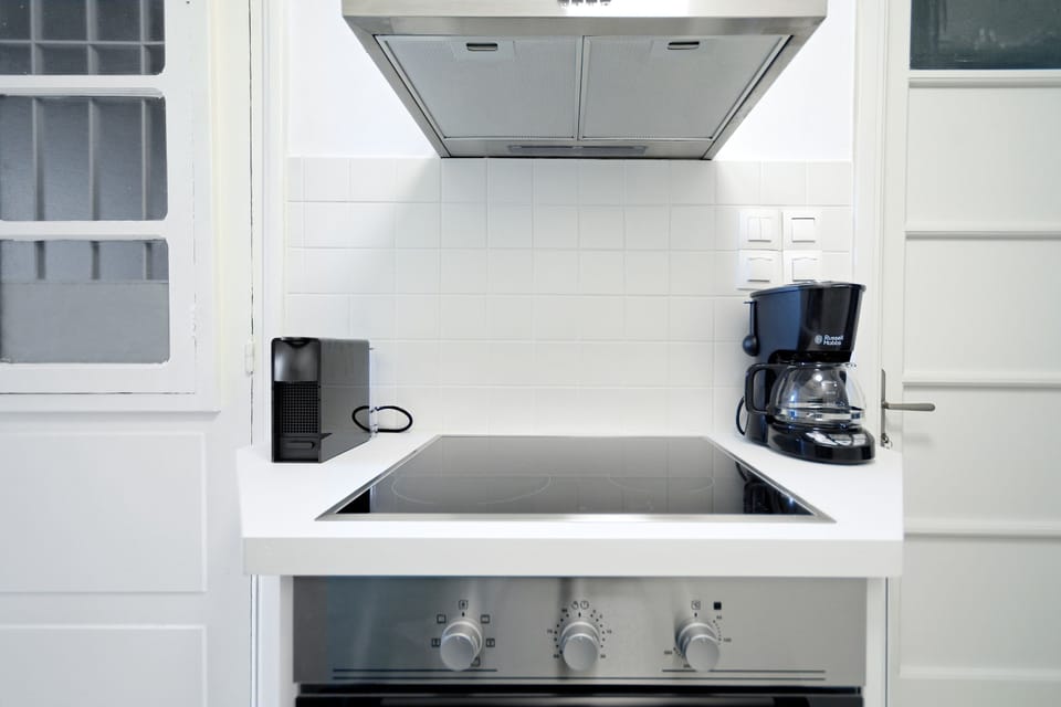Deluxe Apartment, 4 Bedrooms, Private Bathroom, Ground Floor | Private kitchen | Full-size fridge, microwave, oven, stovetop