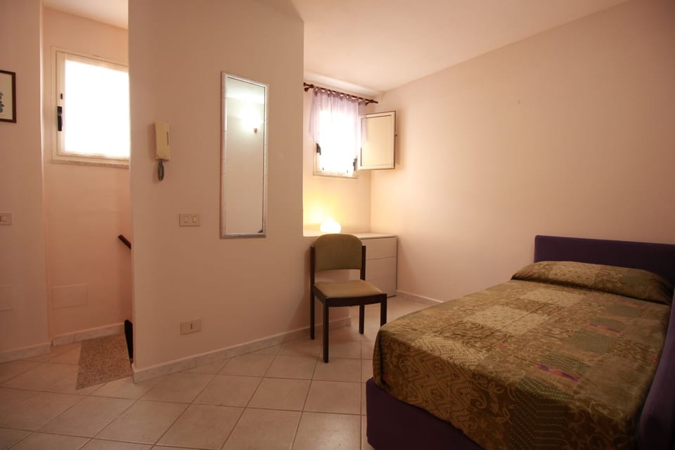 Apartment, 1 Bedroom | Iron/ironing board, bed sheets
