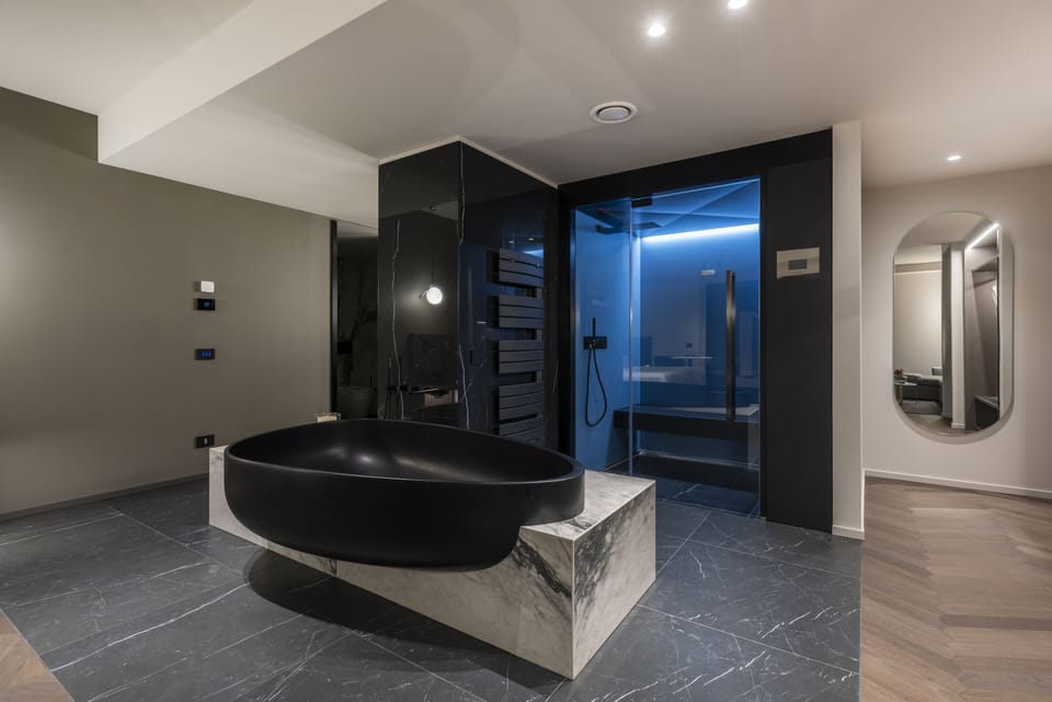 Suite, 1 King Bed, Balcony, Lake View (Argantos) | Bathroom | Free toiletries, hair dryer, bathrobes, slippers