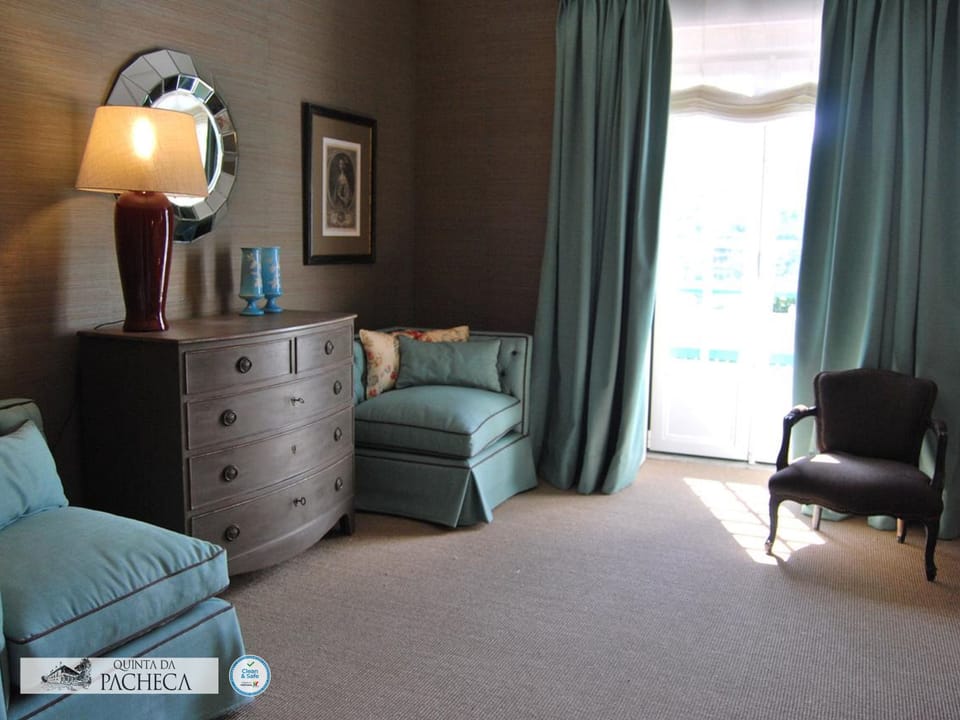 Superior Double Room | Living area | 32-inch LCD TV with cable channels, TV