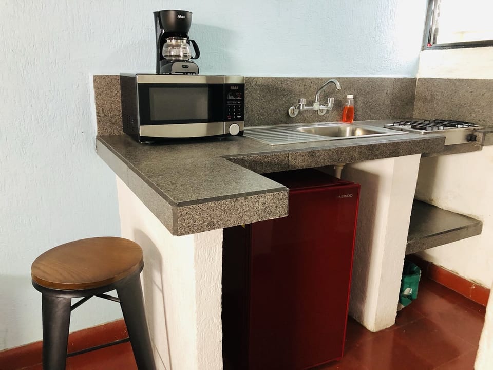 Standard Room | Private kitchen | Fridge, microwave, stovetop, cookware/dishes/utensils