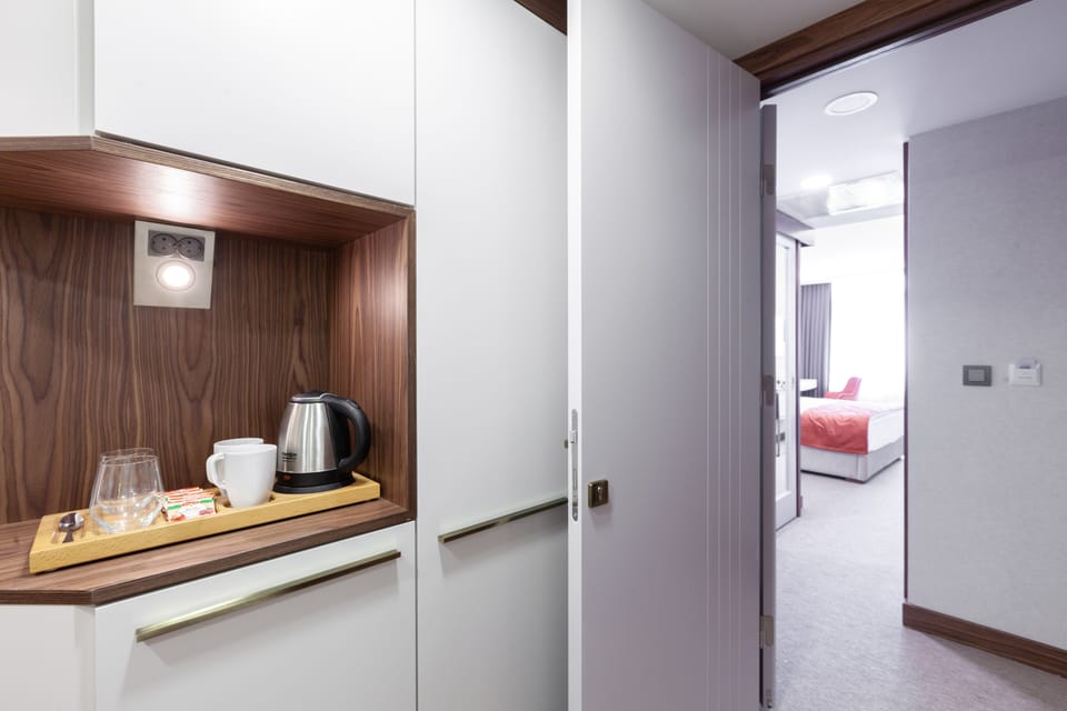 Deluxe Quadruple Room | Egyptian cotton sheets, premium bedding, minibar, in-room safe