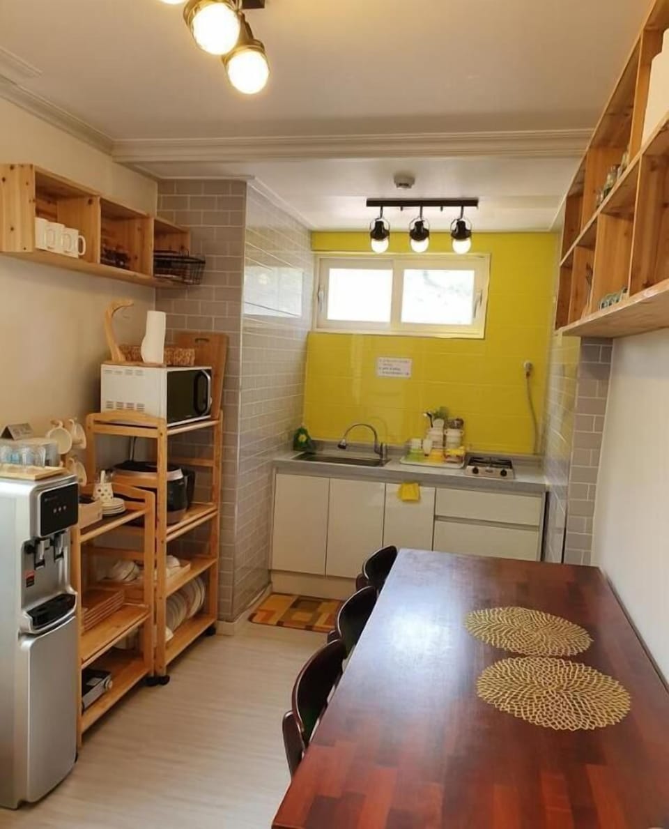 Shared fridge, electric kettle, cookware/dishes/utensils