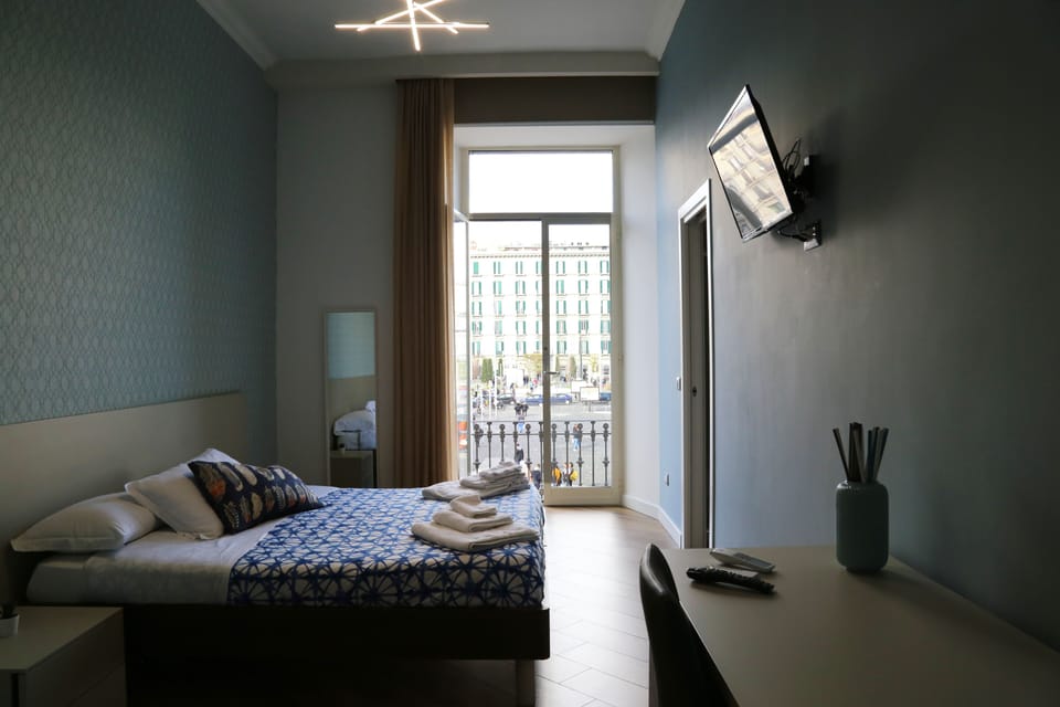 Deluxe Double or Twin Room, City View | In-room safe, desk, laptop workspace, blackout drapes