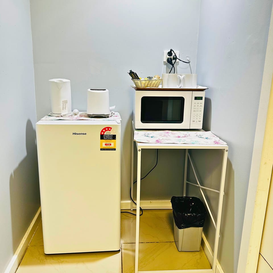 Deluxe Apartment | Living area | 80-cm TV with digital channels