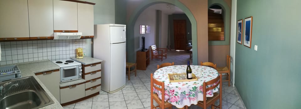 Family Apartment, 2 Bedrooms, Garden View, Oceanfront | Private kitchen | Full-size fridge, coffee/tea maker, electric kettle