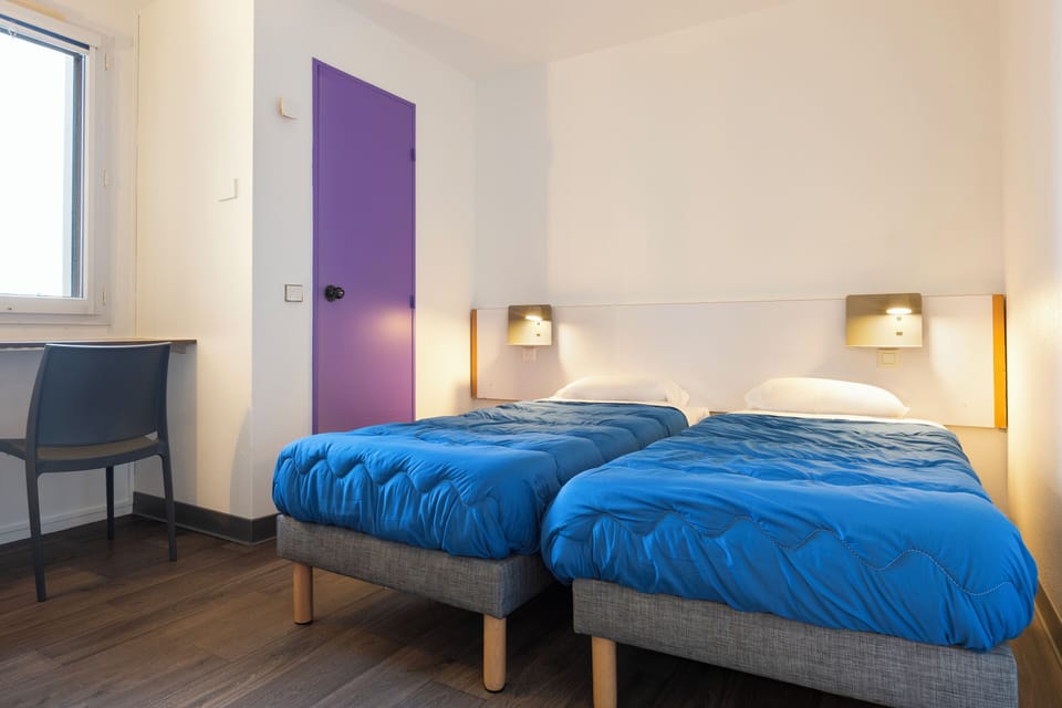 Desk, blackout drapes, free WiFi, bed sheets