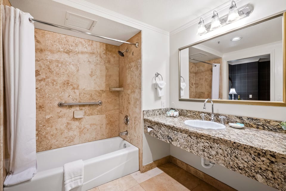 Deluxe Room, 2 Queen Beds (Main Inn) | Bathroom | Shower, free toiletries, hair dryer, towels