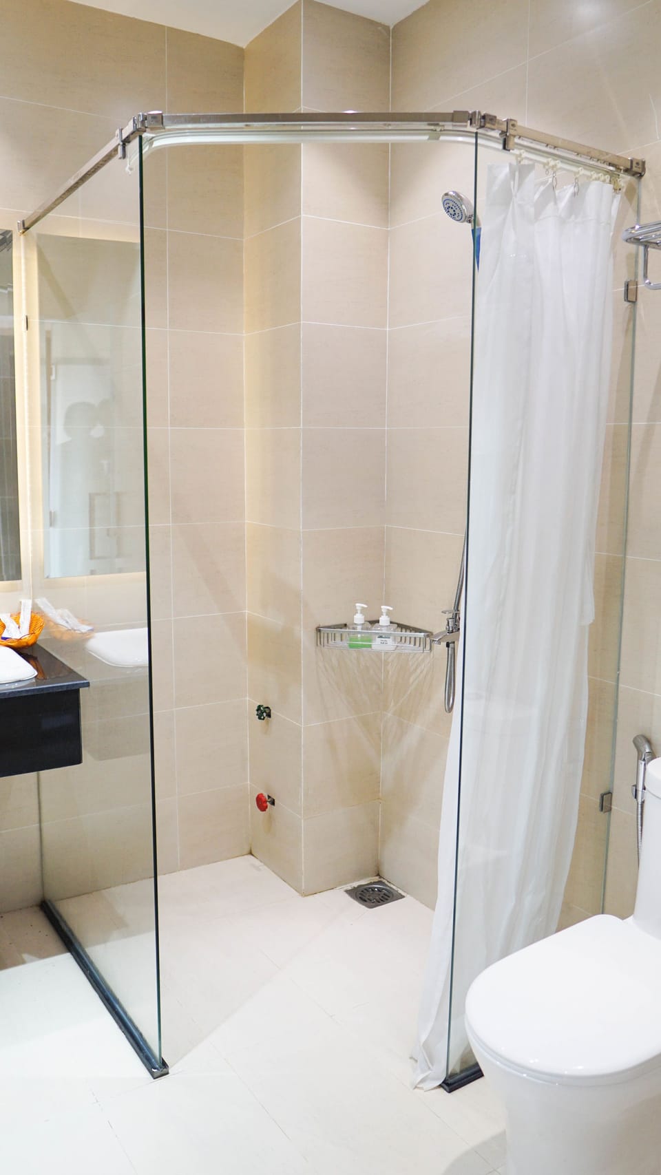 Shower, free toiletries, hair dryer, slippers