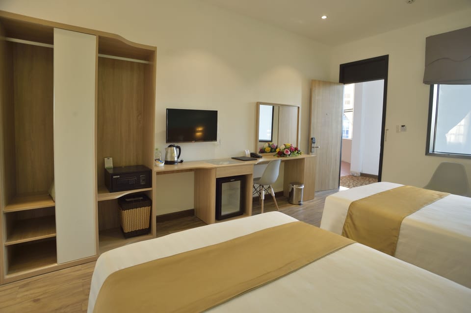Deluxe Room | Minibar, in-room safe, desk, free WiFi