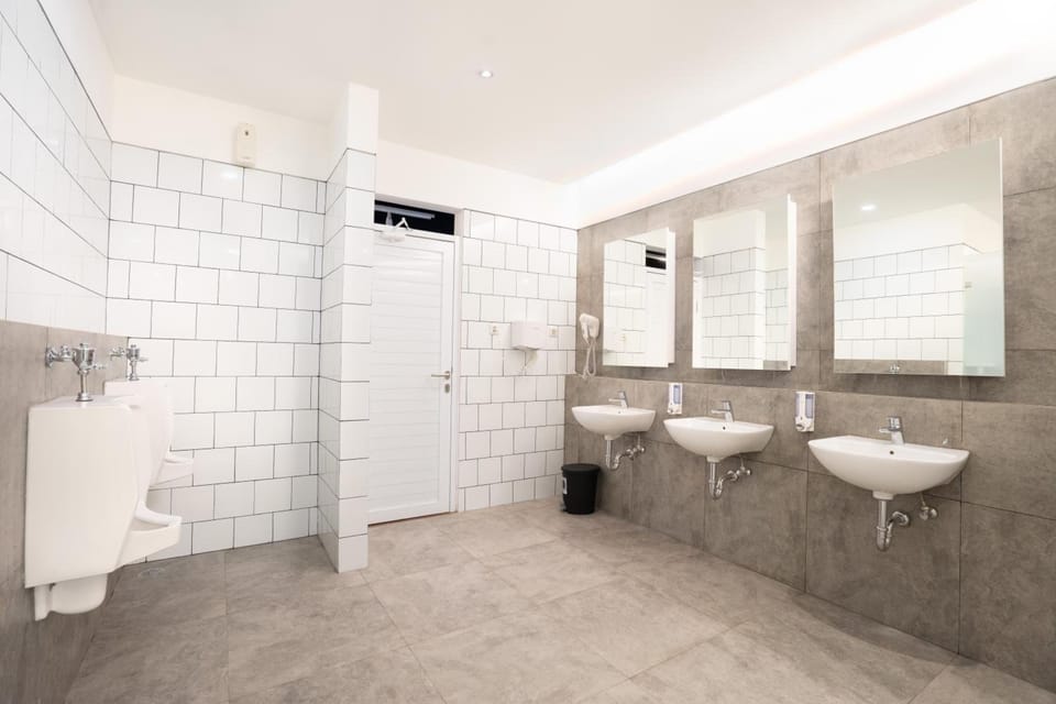Shower, hair dryer, slippers, towels