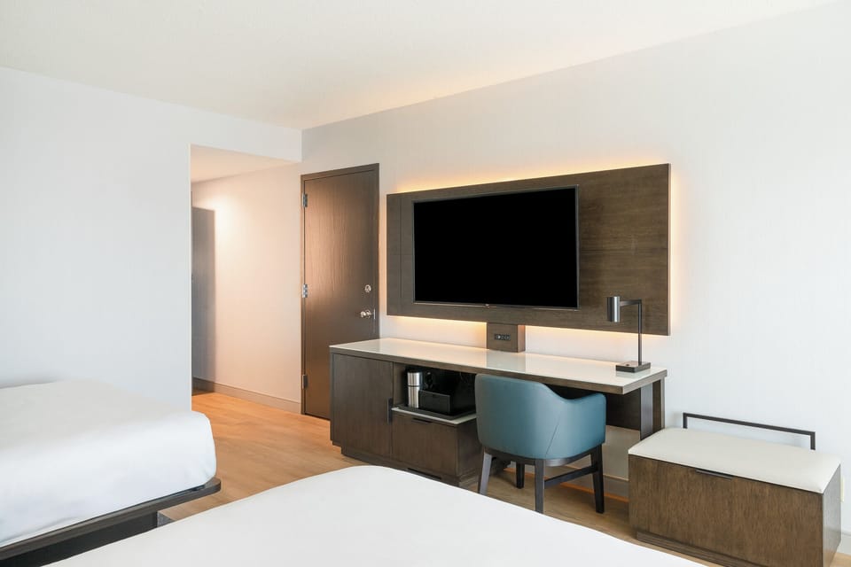 Premium bedding, down comforters, desk, blackout drapes