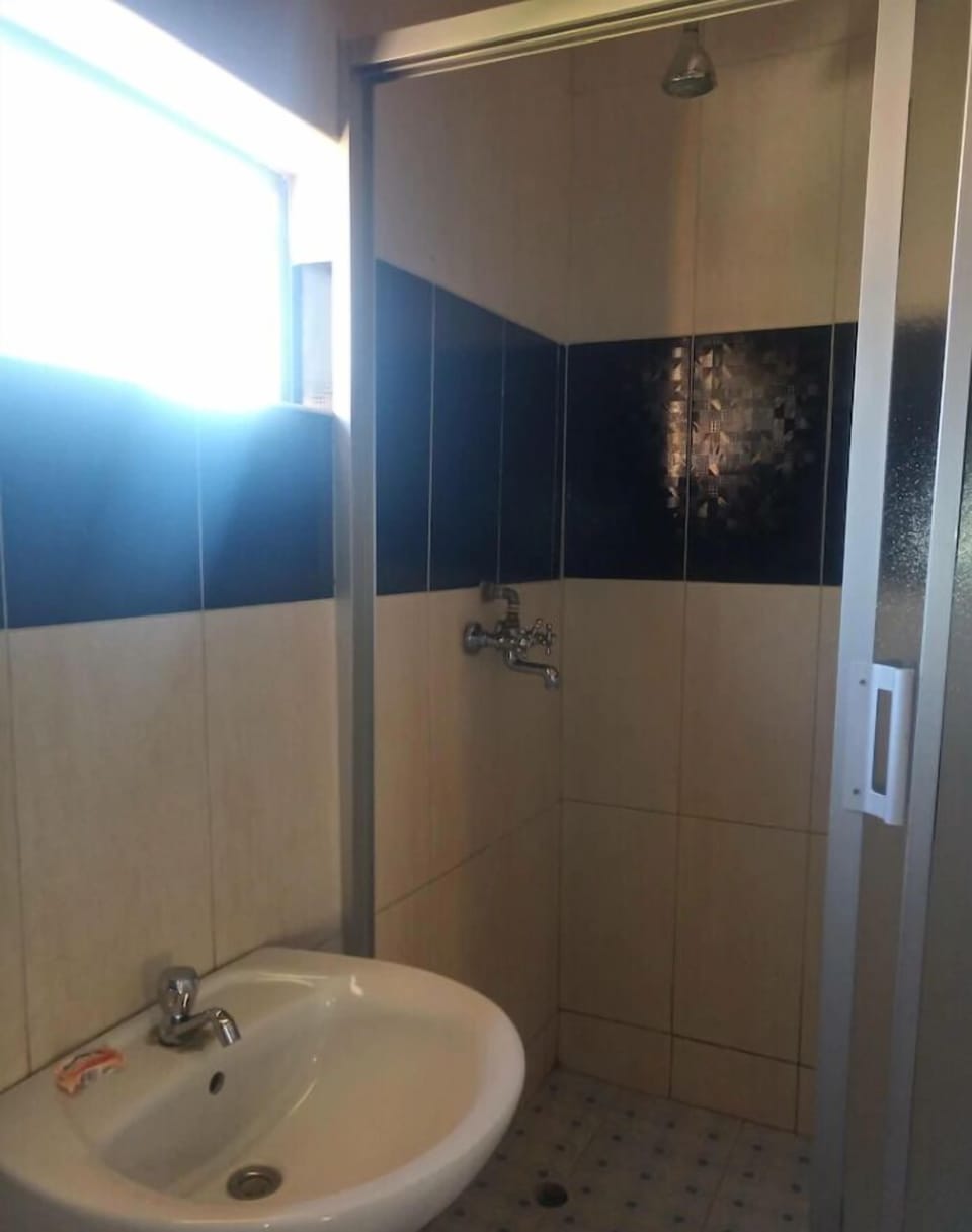 Shower, free toiletries, hair dryer, slippers
