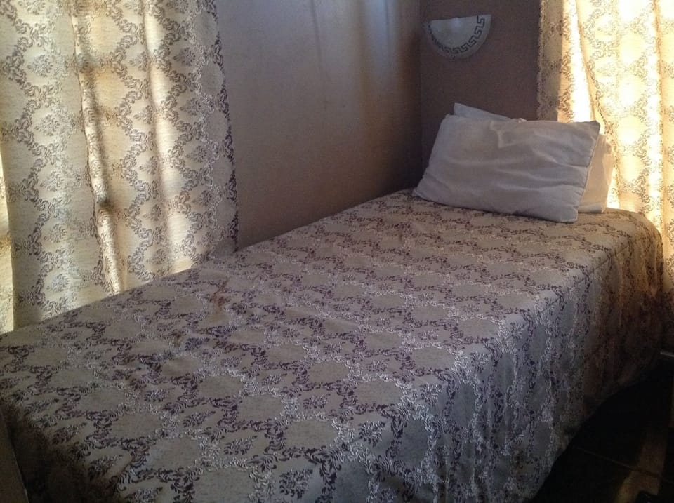 Desk, laptop workspace, iron/ironing board, rollaway beds