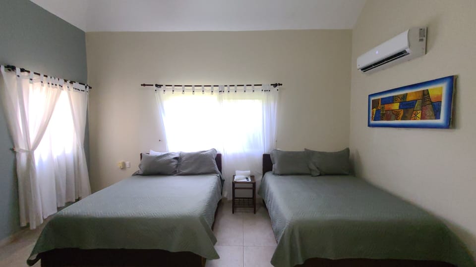 Family Villa (4 Bedrooms) | 2 bedrooms, iron/ironing board, bed sheets