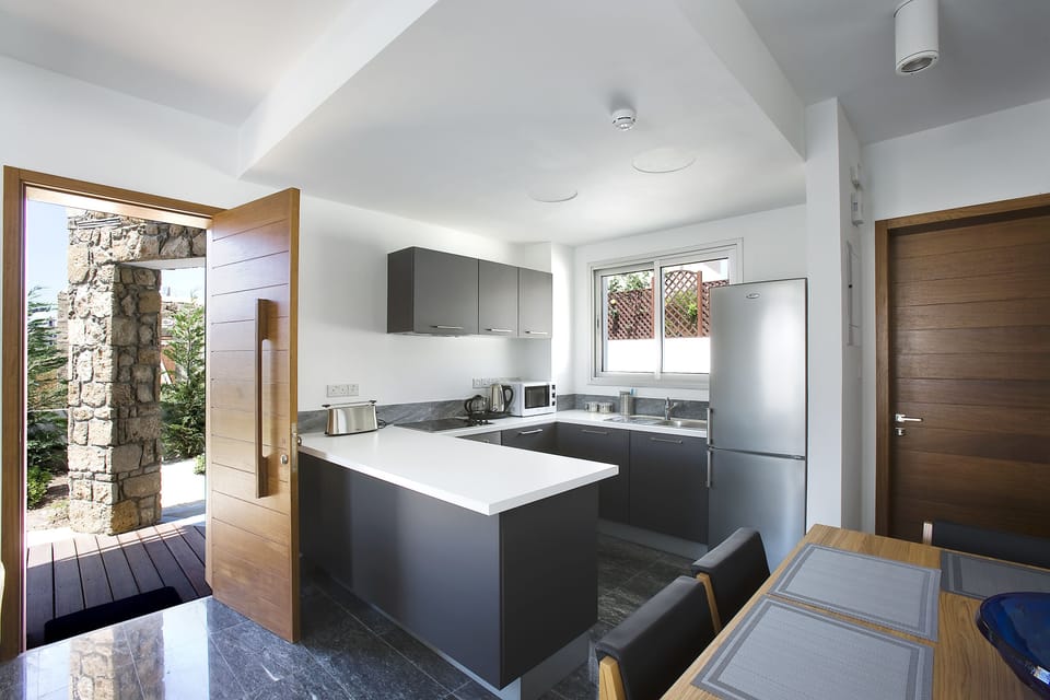 Villa, 1 Bedroom (Indigo ) | Private kitchen | Coffee/tea maker, fridge, microwave, oven