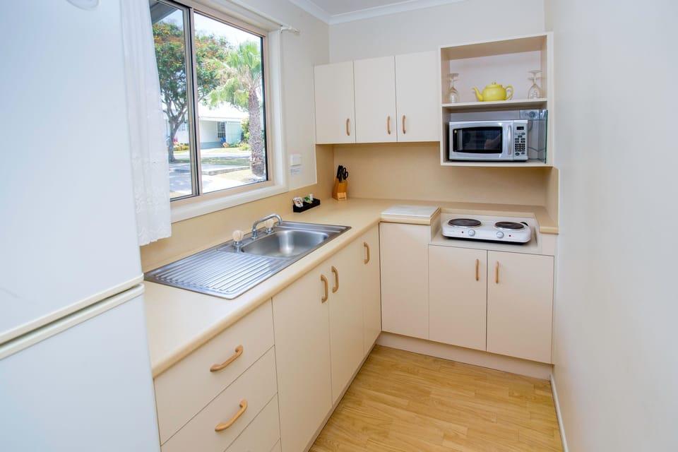 Superior 2 Bedroom Cabin | Private kitchen | Fridge, microwave, stovetop, electric kettle