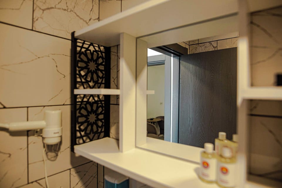 Exclusive Room | Bathroom | Shower, slippers, bidet, towels