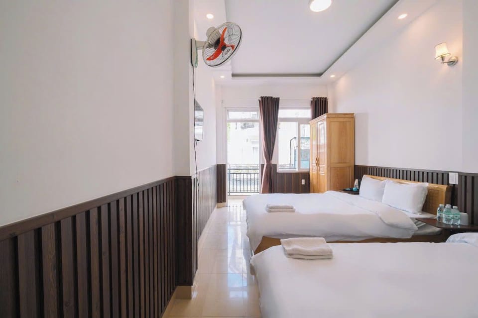 Quadruple Room with Balcony | Premium bedding, memory foam beds, individually decorated