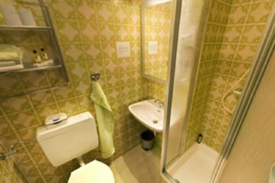Shower, rainfall showerhead, hair dryer, towels