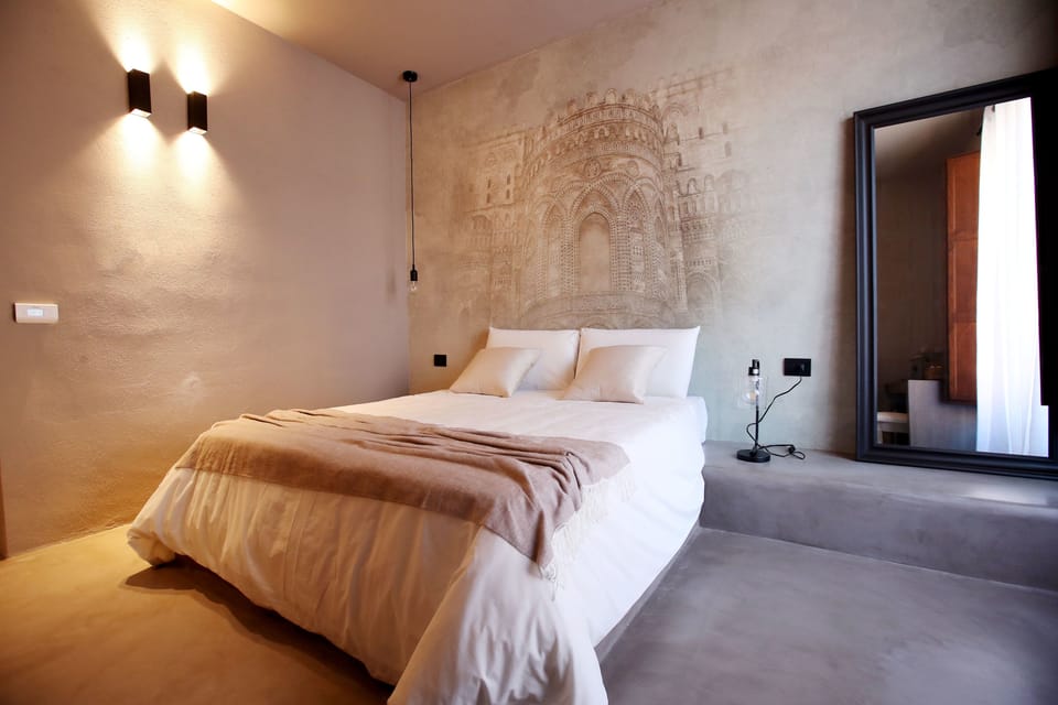 Deluxe Room, Balcony (Monreale) | Minibar, in-room safe, desk, blackout drapes