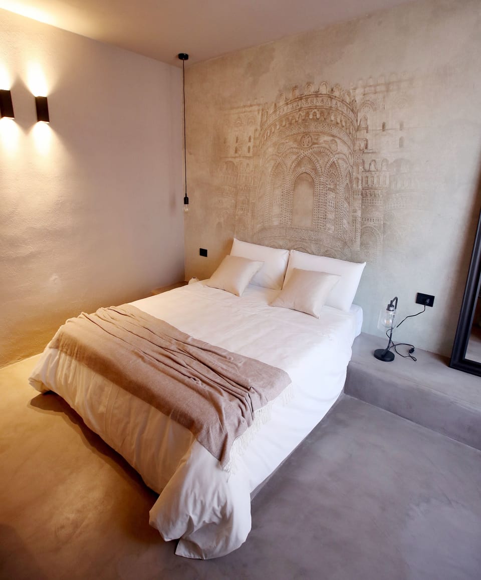 Deluxe Room, Balcony (Monreale) | Minibar, in-room safe, desk, blackout drapes