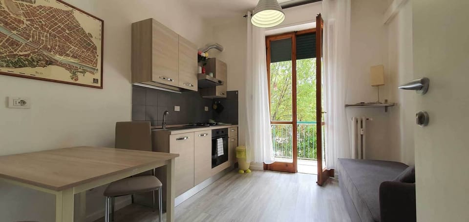 Family Studio | Living area | 28-inch flat-screen TV with digital channels, TV