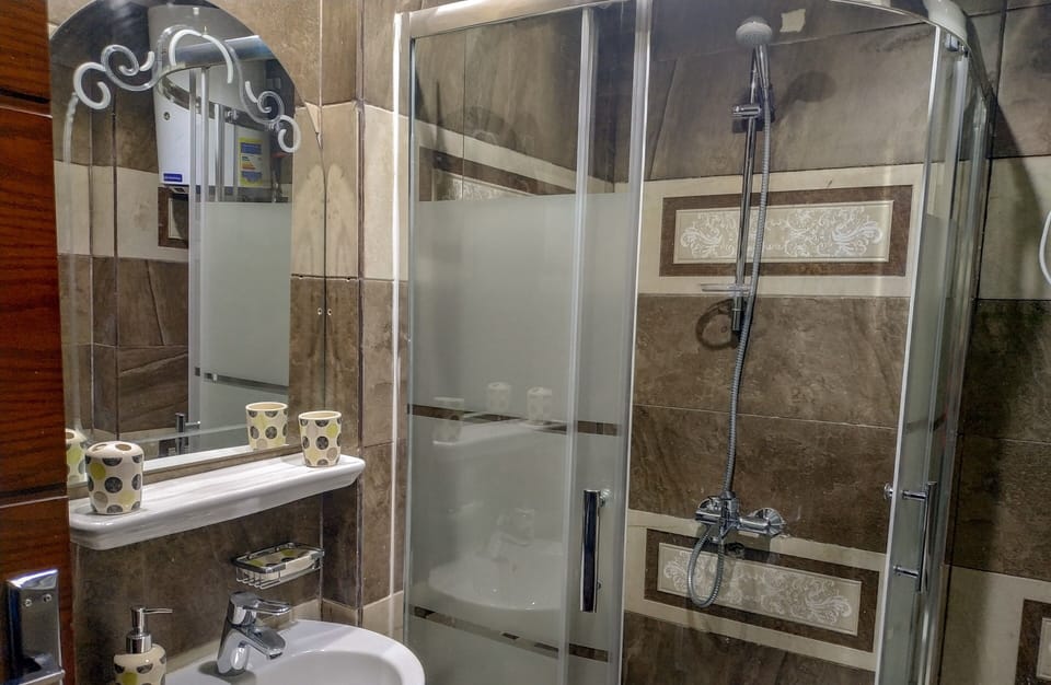 Rainfall showerhead, slippers, bidet, towels