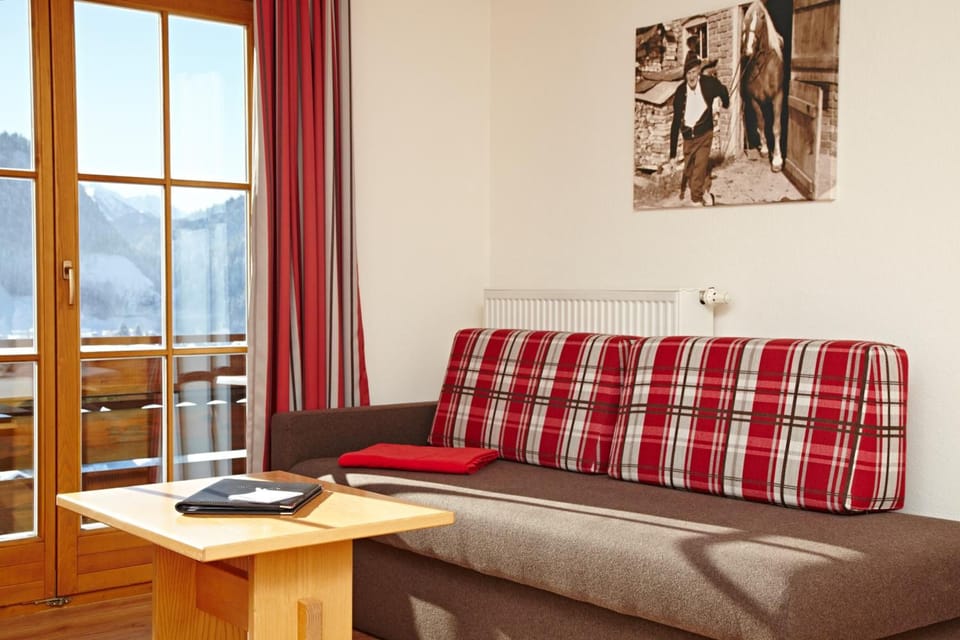 Comfort Double Room | Living room | Flat-screen TV