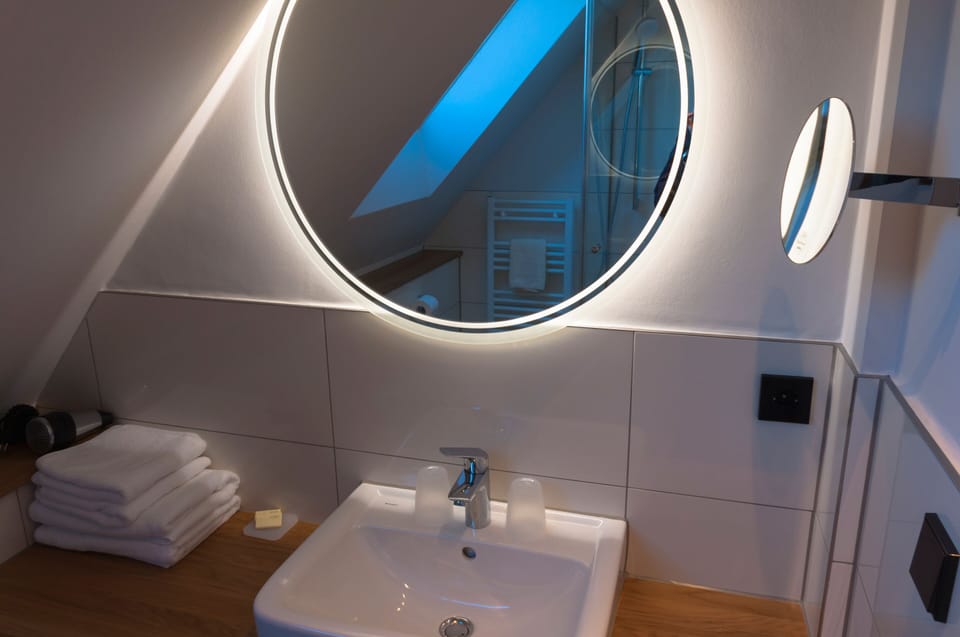 Family Room | Bathroom | Shower, hair dryer, towels, soap