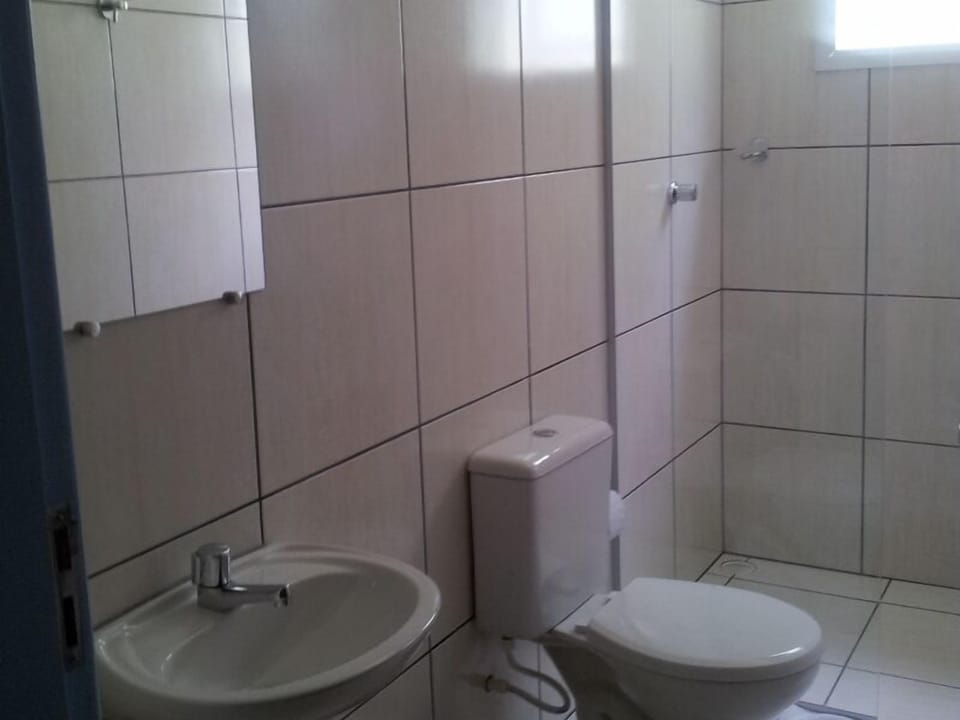 Economy Double Room | Bathroom | Shower, towels, toilet paper