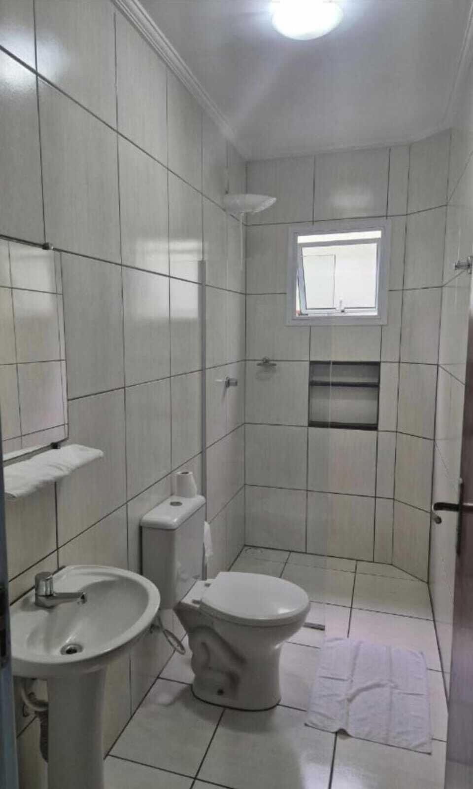 Shower, towels, toilet paper