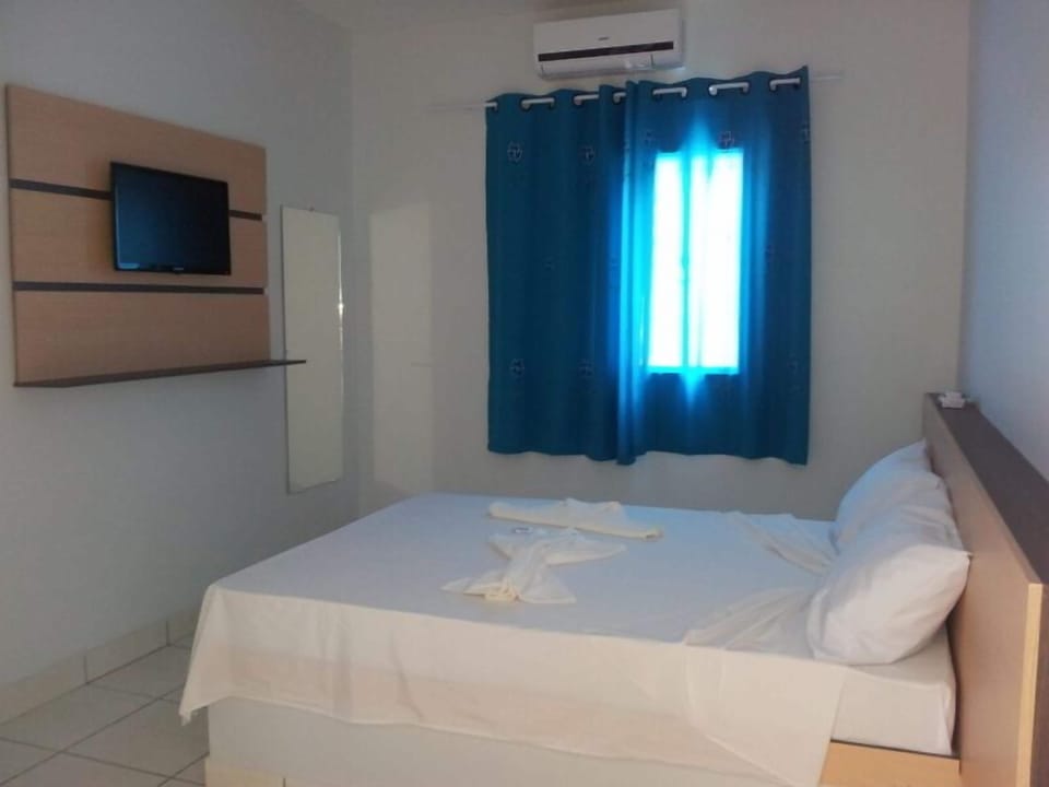 Economy Double Room | Minibar, desk, free WiFi, bed sheets
