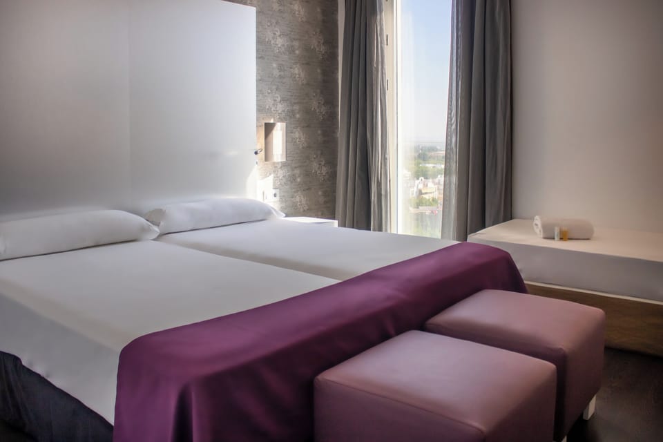 Triple Room | In-room safe, desk, laptop workspace, blackout drapes