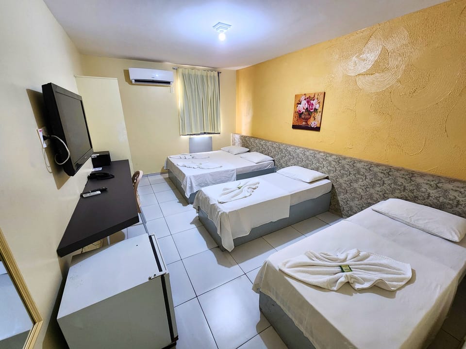 Family Quadruple Room, Non Smoking | In-room safe, individually decorated, desk, laptop workspace