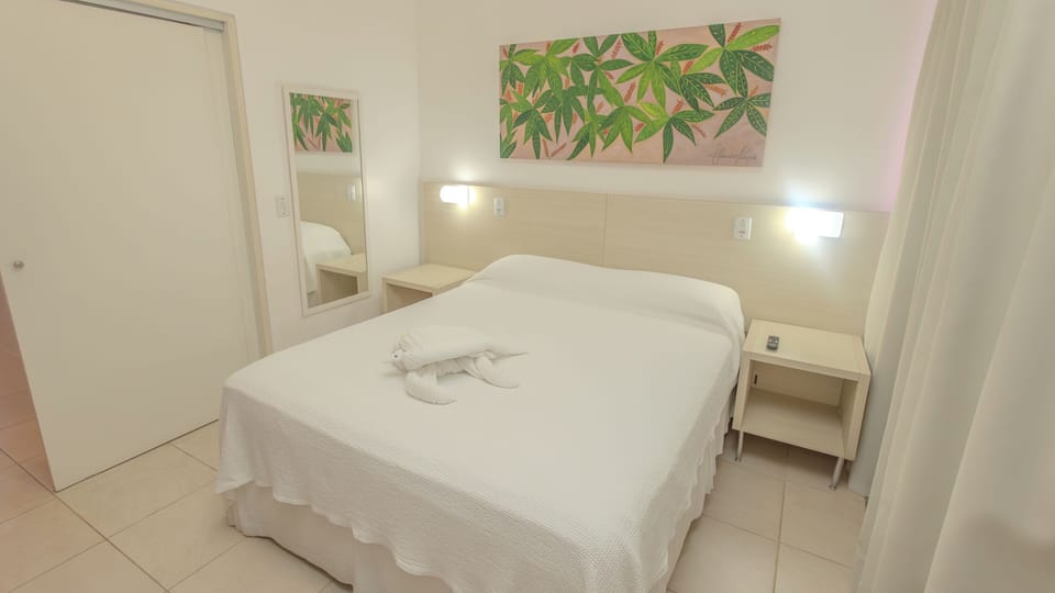 Flat - facing the road | Minibar, in-room safe, blackout drapes, WiFi (free)