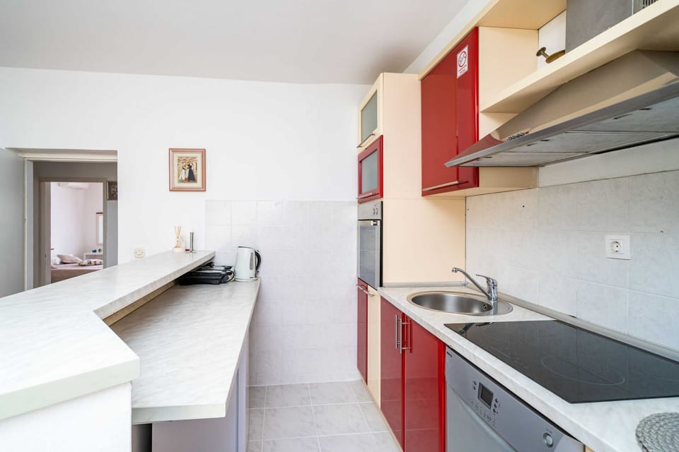 Apartment (Two-Bedroom Apartment with Balcony) | Private kitchen | Fridge, dishwasher, cookware/dishes/utensils
