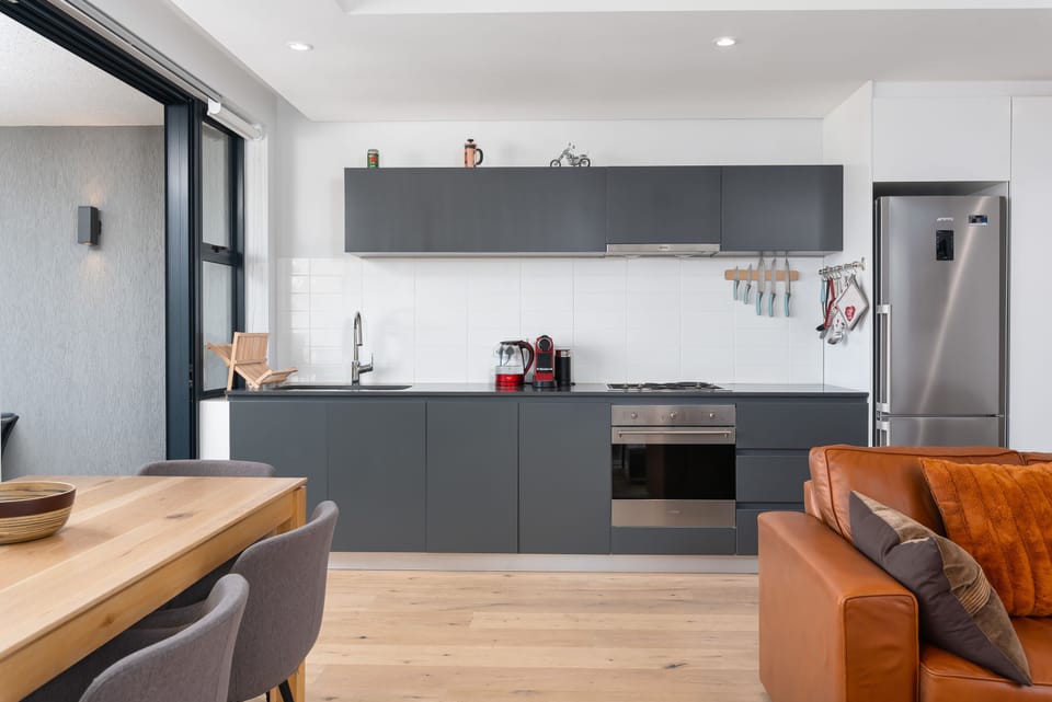 Luxury Apartment | Private kitchen | Full-size fridge, microwave, oven, stovetop