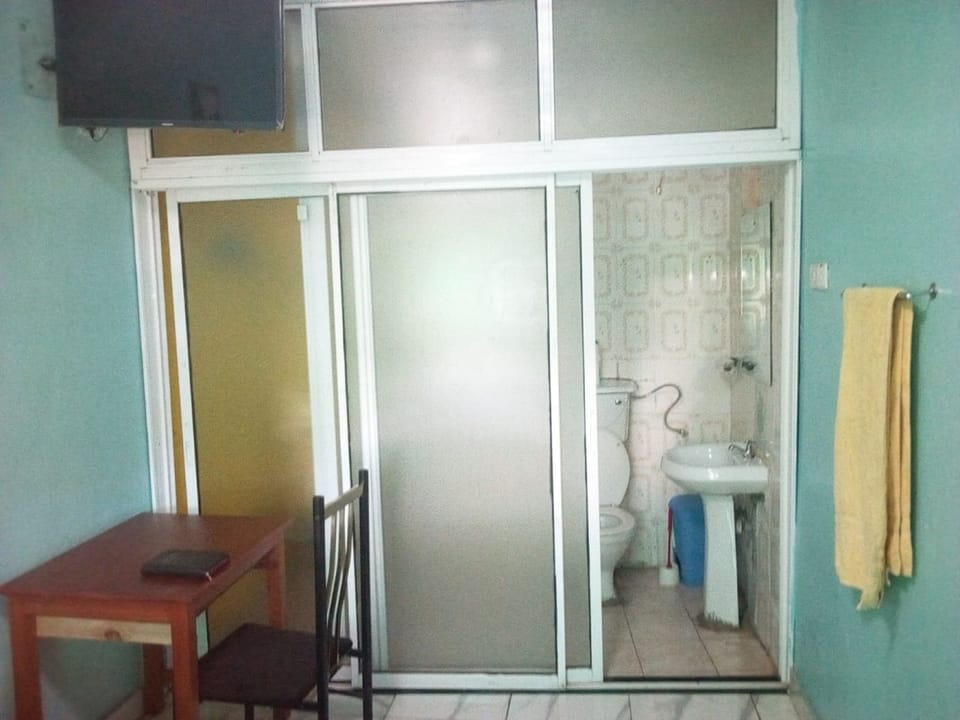 Double or Twin Room | Bathroom | Shower, slippers, towels, soap