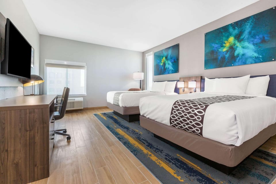 Pillowtop beds, desk, laptop workspace, blackout drapes