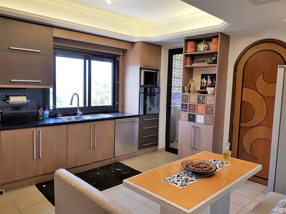 Apartment, 2 Bedrooms | Private kitchen | Full-size fridge, microwave, oven, stovetop