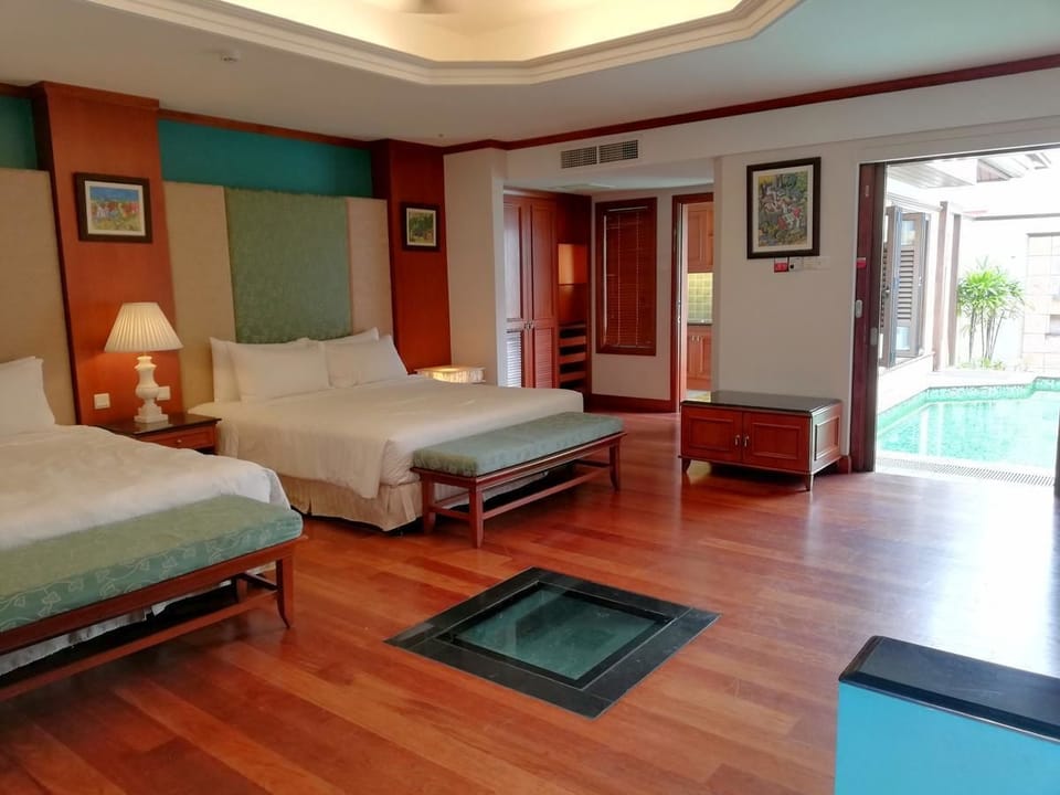 Premium Pool Villa | Minibar, desk, laptop workspace, blackout drapes