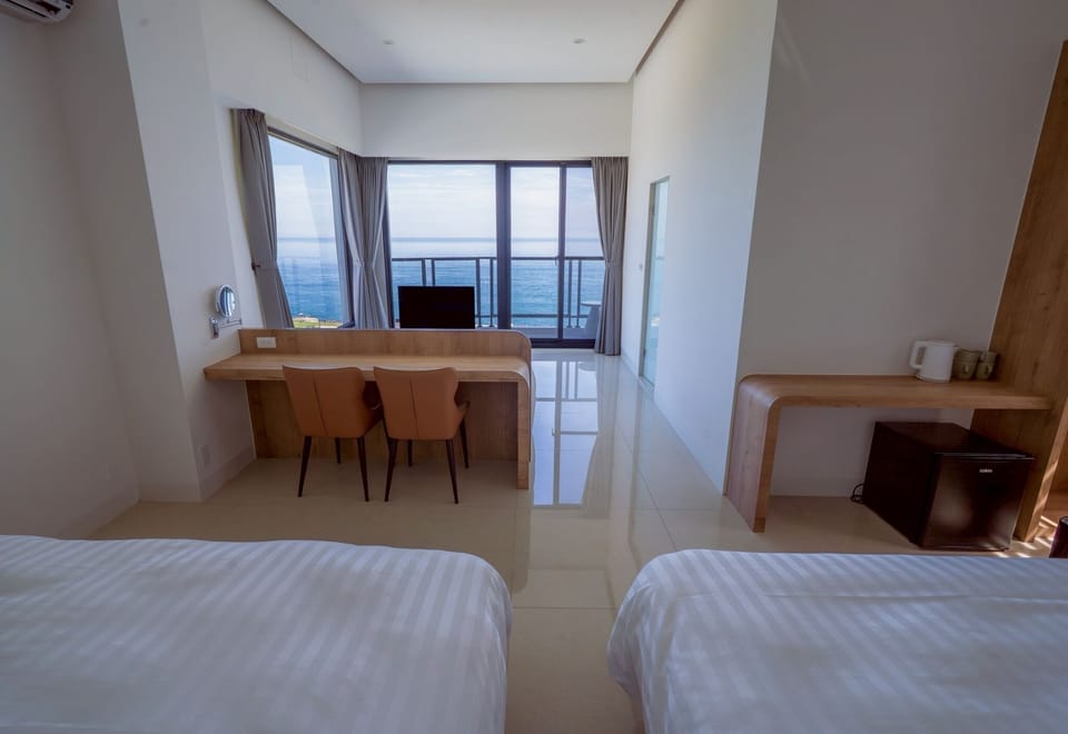 Superior Suite with Sea View | Premium bedding, down comforters, memory foam beds, desk
