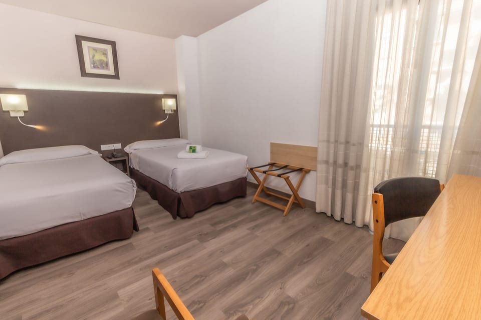 Standard Triple Room, 3 Twin Beds (for 2 adults and 1 child) | 1 bedroom, down comforters, minibar, in-room safe