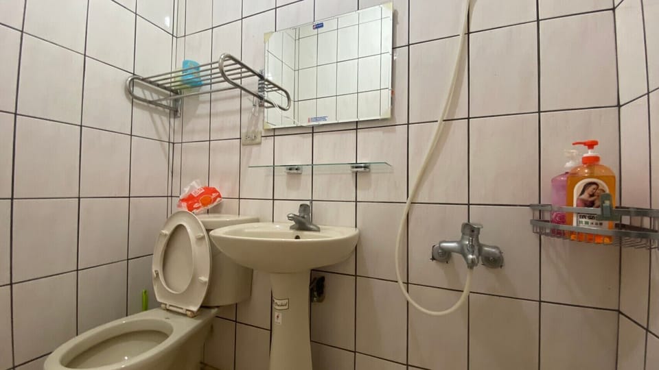 Shower, free toiletries, hair dryer, slippers