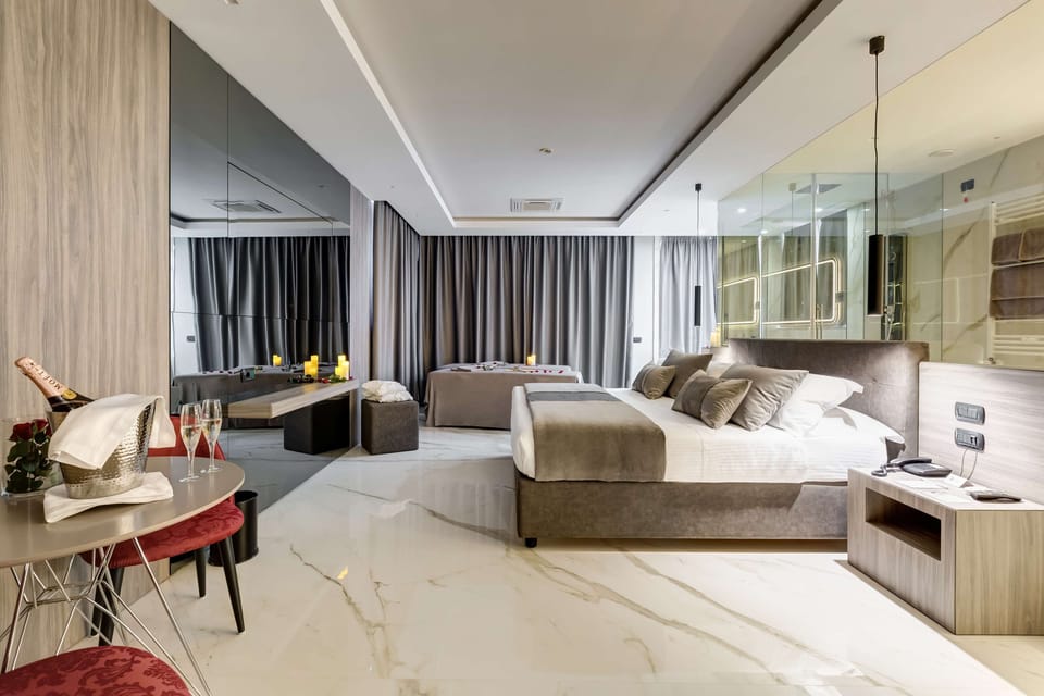 Suite, 1 King Bed, Balcony (Living Room) | 8 bedrooms, minibar, in-room safe, desk