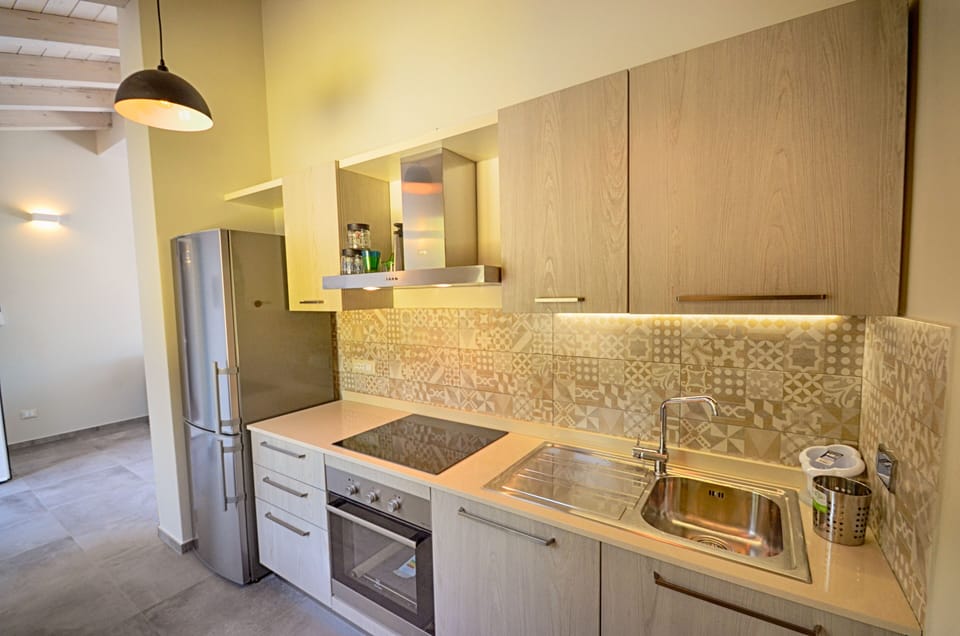 Apartment, 2 Bedrooms (6 Prs) | Private kitchen | Full-size fridge, stovetop, dishwasher, coffee/tea maker